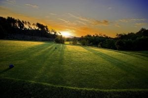 a tee box at sunset at terre blanche golf course france